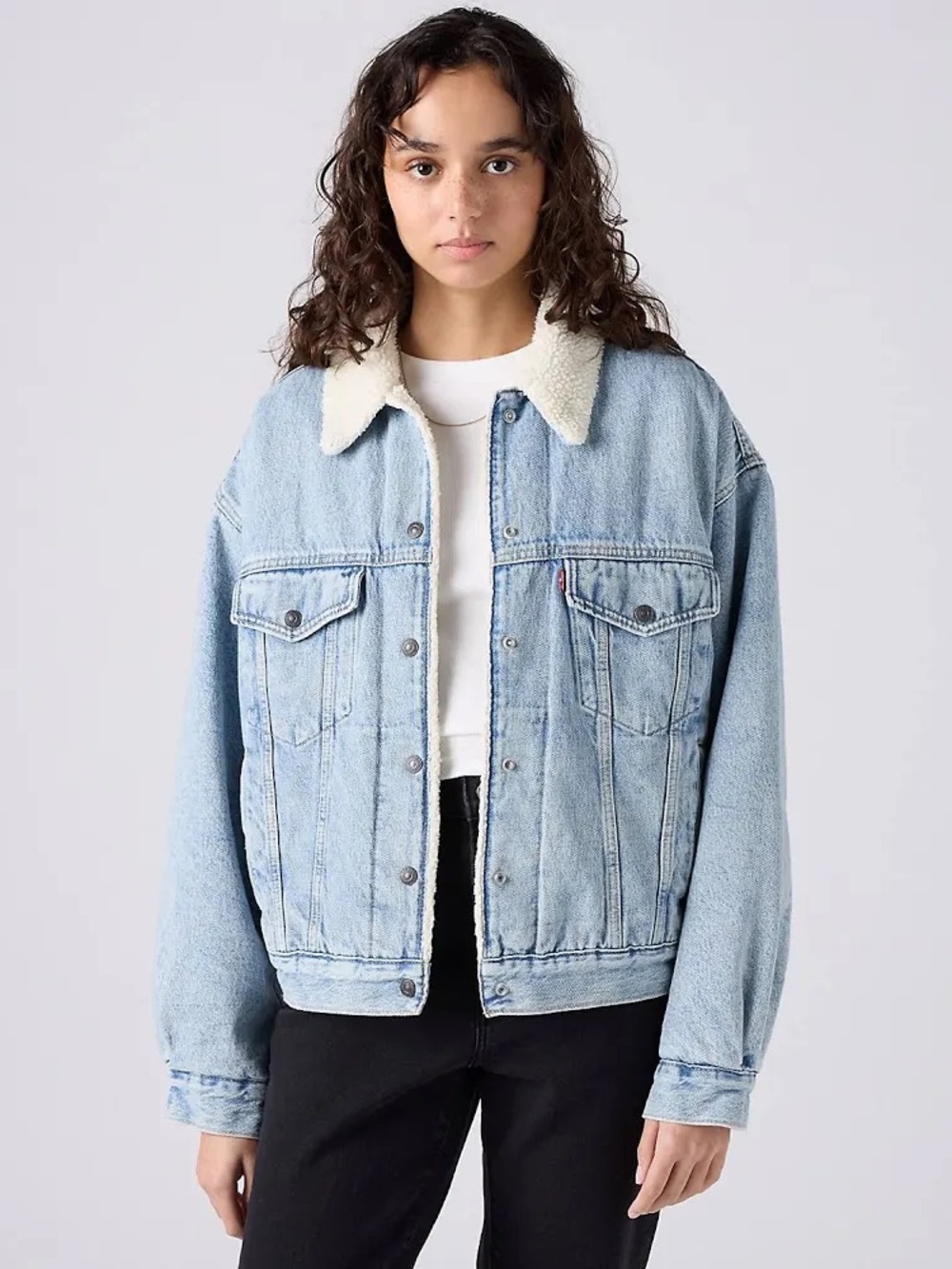 Levi’s light wash denim jacket with sherpa lining.